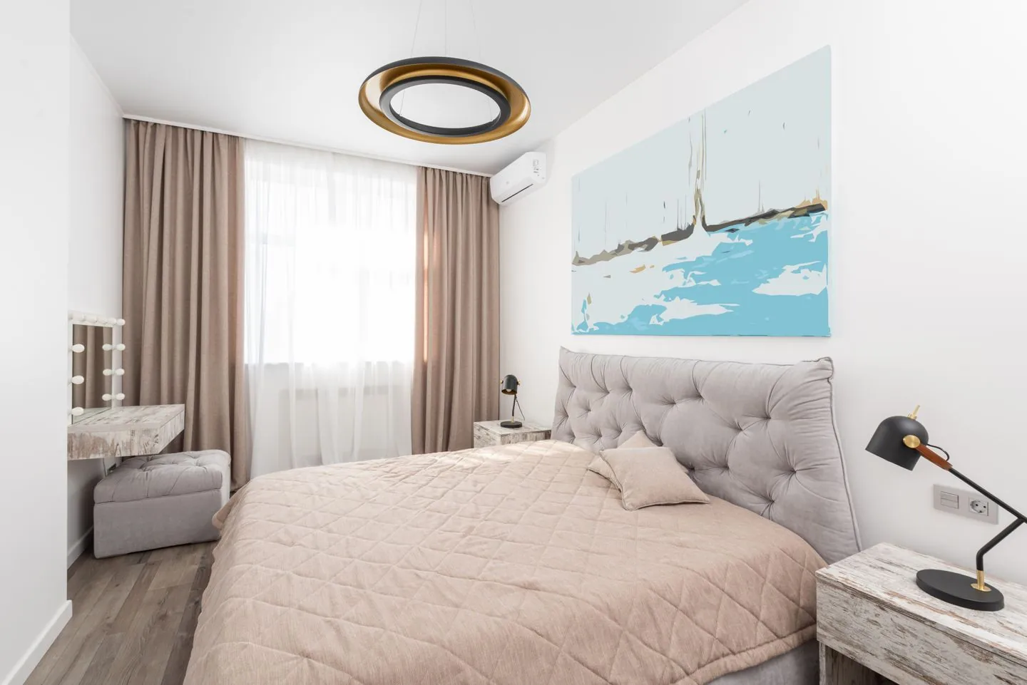 Bed with a bedside table on either side