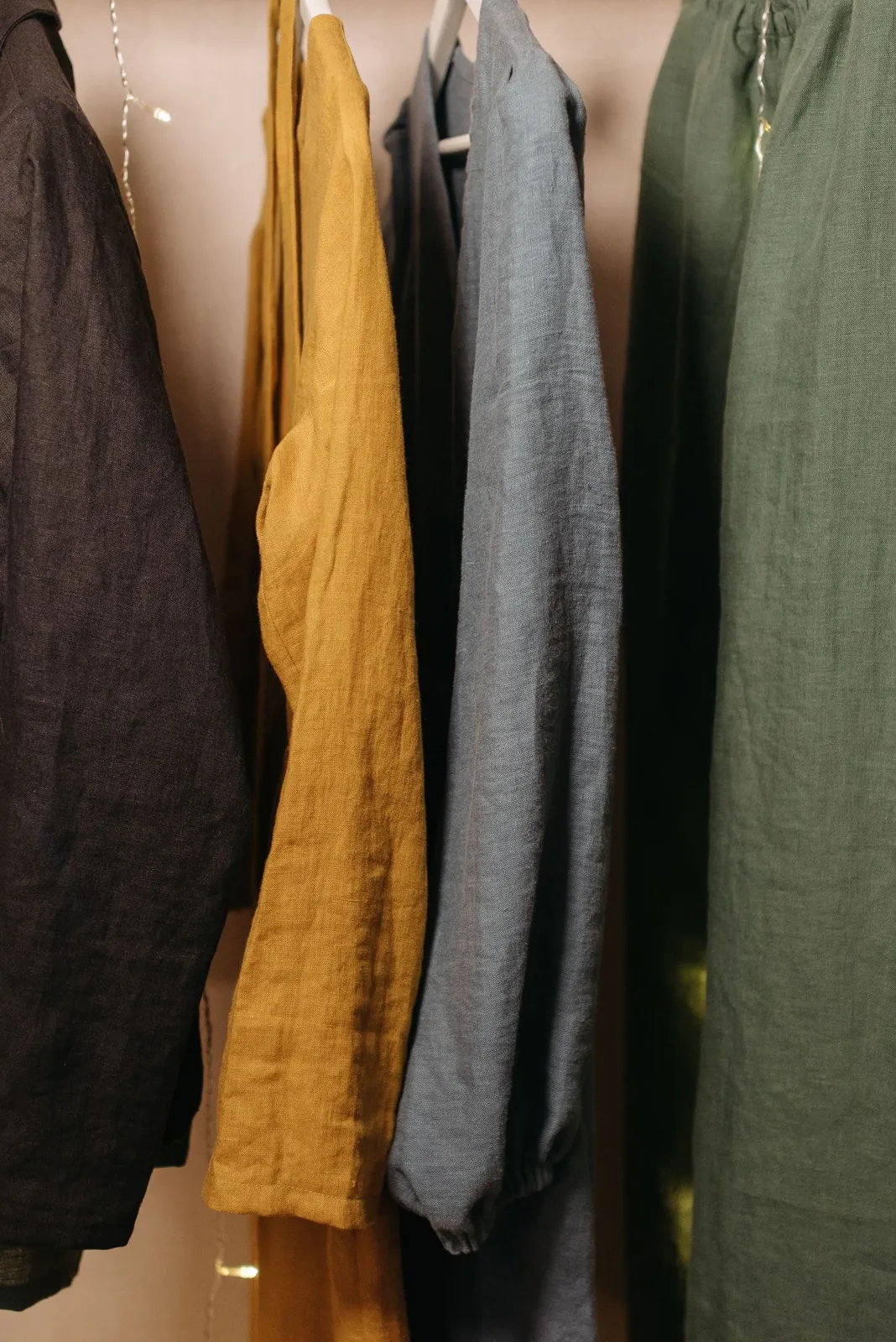 Linen clothes hanging neatly on a rail