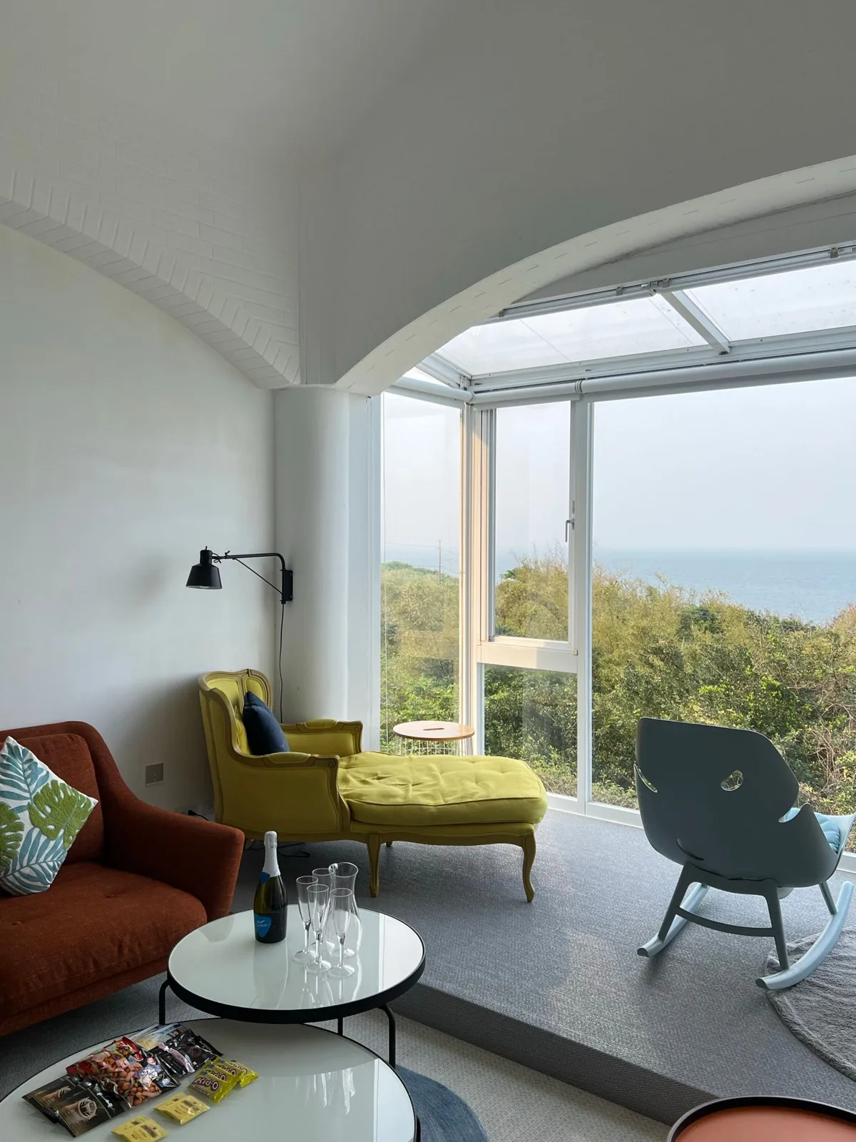 Seating arranged in front of a wide bay window
